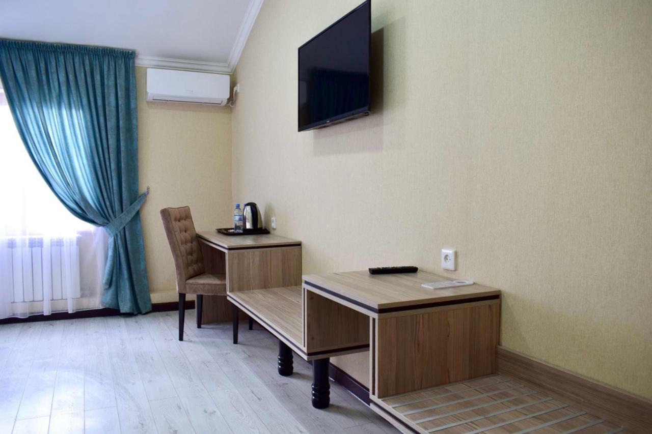 Dostar Inn Shymkent Esterno foto