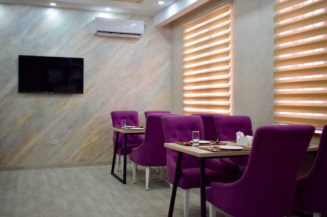 Dostar Inn Shymkent Esterno foto