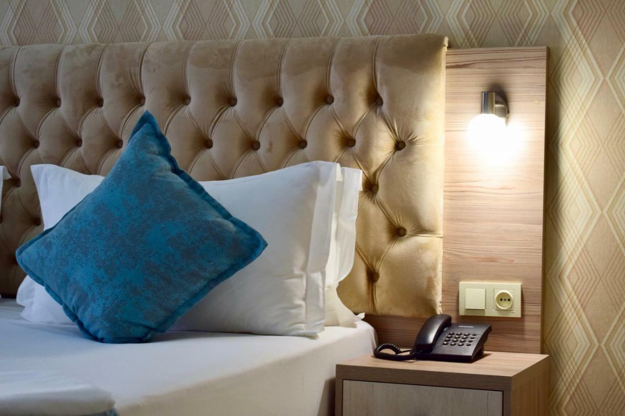 Dostar Inn Shymkent Esterno foto