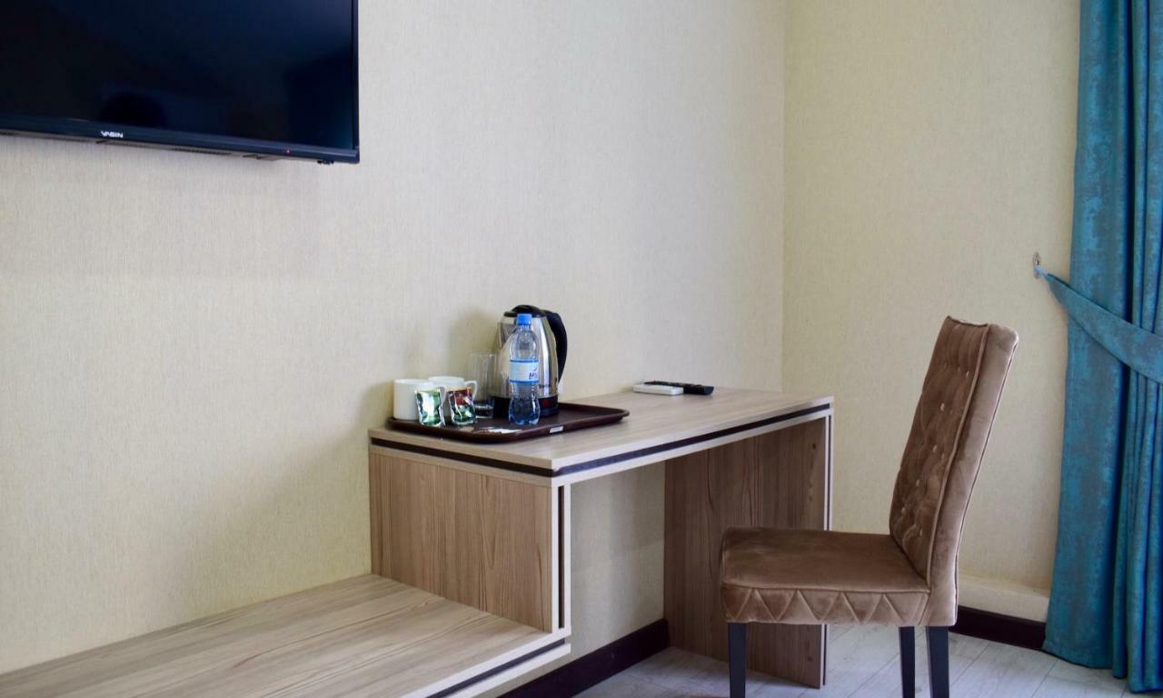 Dostar Inn Shymkent Esterno foto