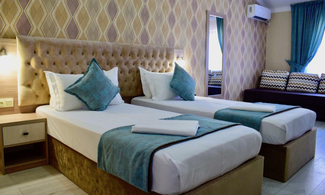 Dostar Inn Shymkent Esterno foto