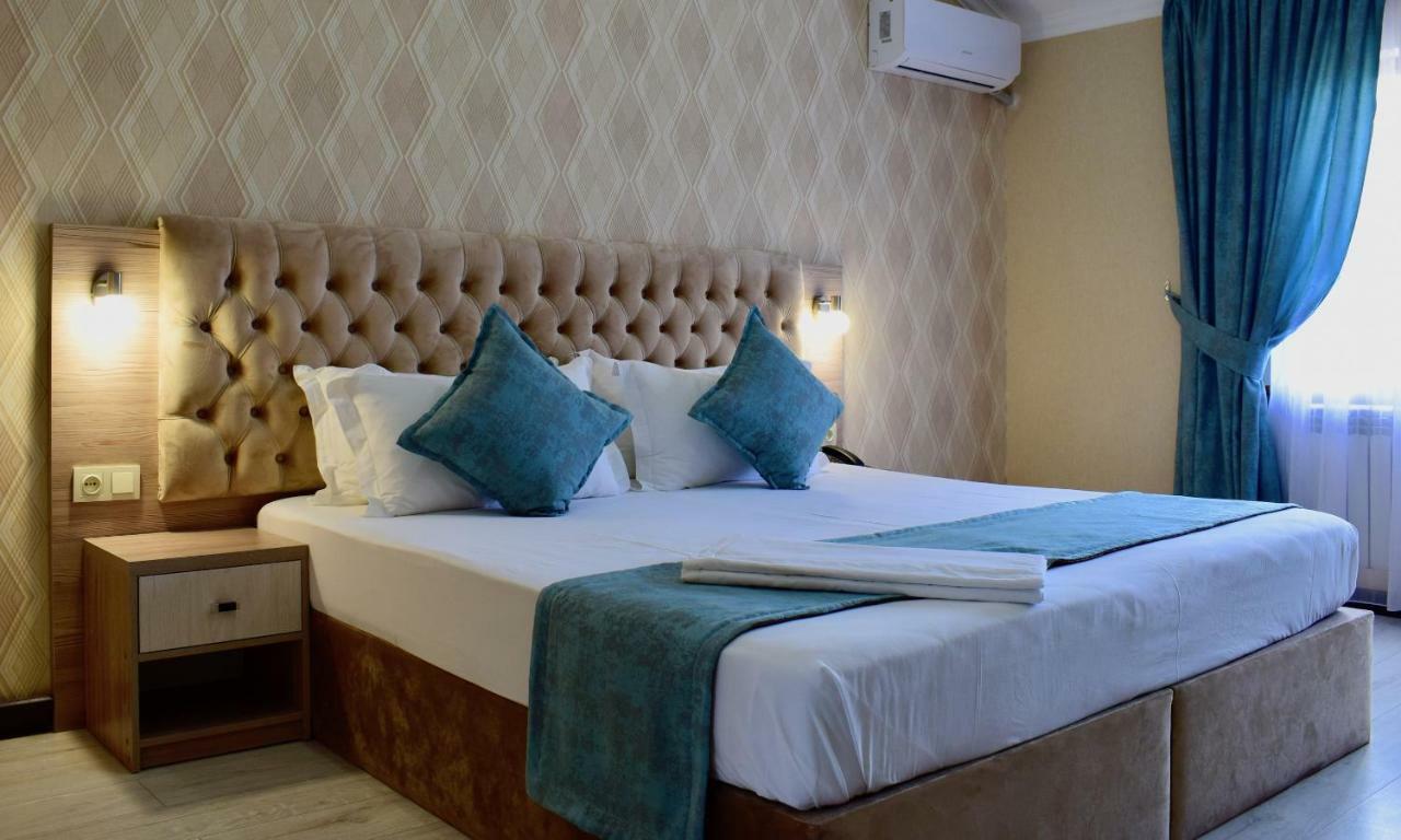 Dostar Inn Shymkent Esterno foto