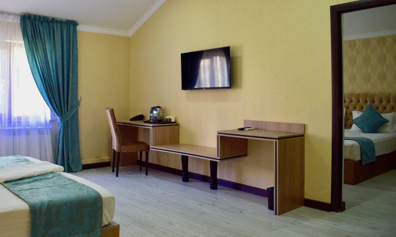 Dostar Inn Shymkent Esterno foto