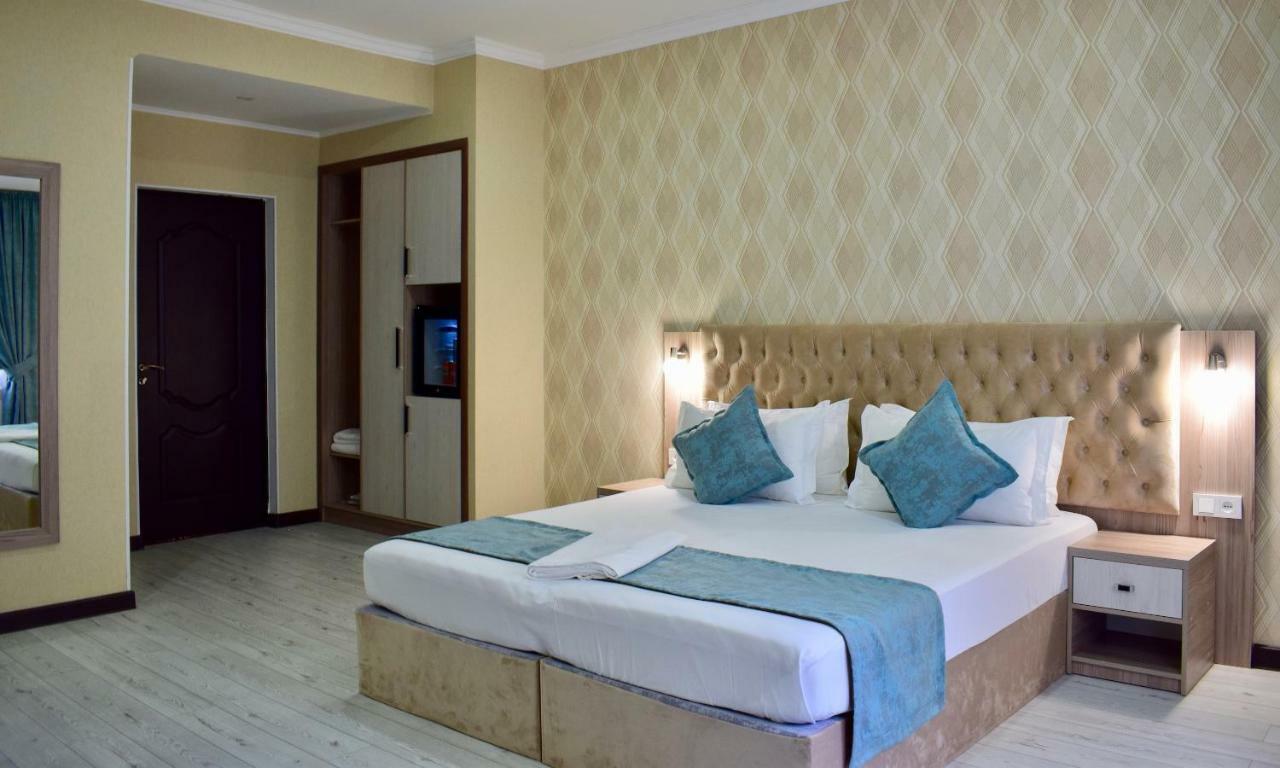 Dostar Inn Shymkent Esterno foto