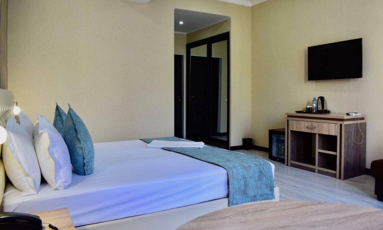 Dostar Inn Shymkent Esterno foto