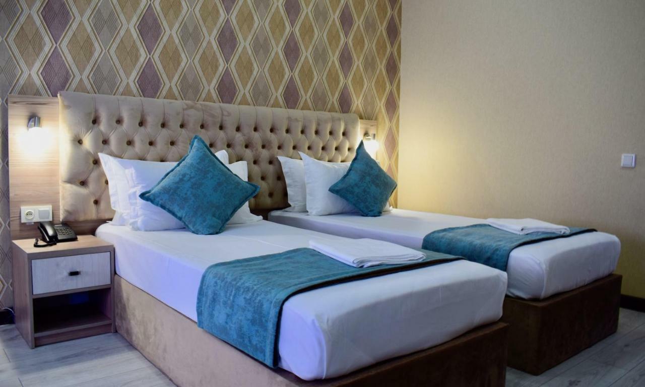 Dostar Inn Shymkent Esterno foto